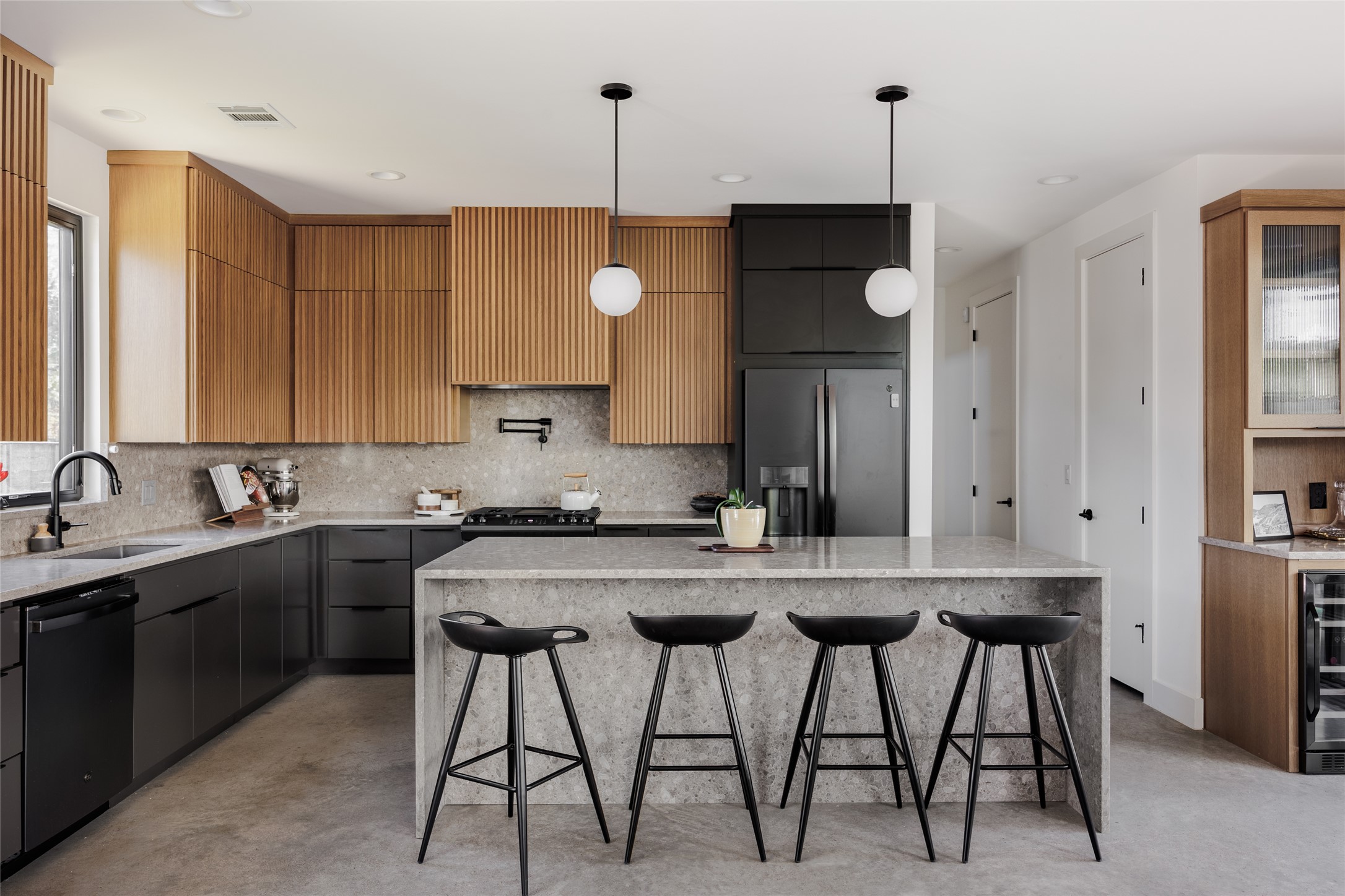 108 Comal Street Austin, TX 78702 - Photo 5 of 40 a kitchen with a table chairs sink and cabinets