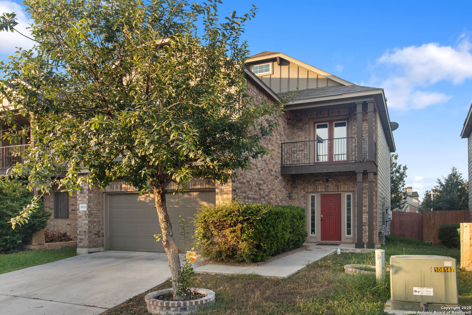 8806 Atwater Creek San Antonio, TX 78245 - Photo 2 of 16 a front view of a house with garden