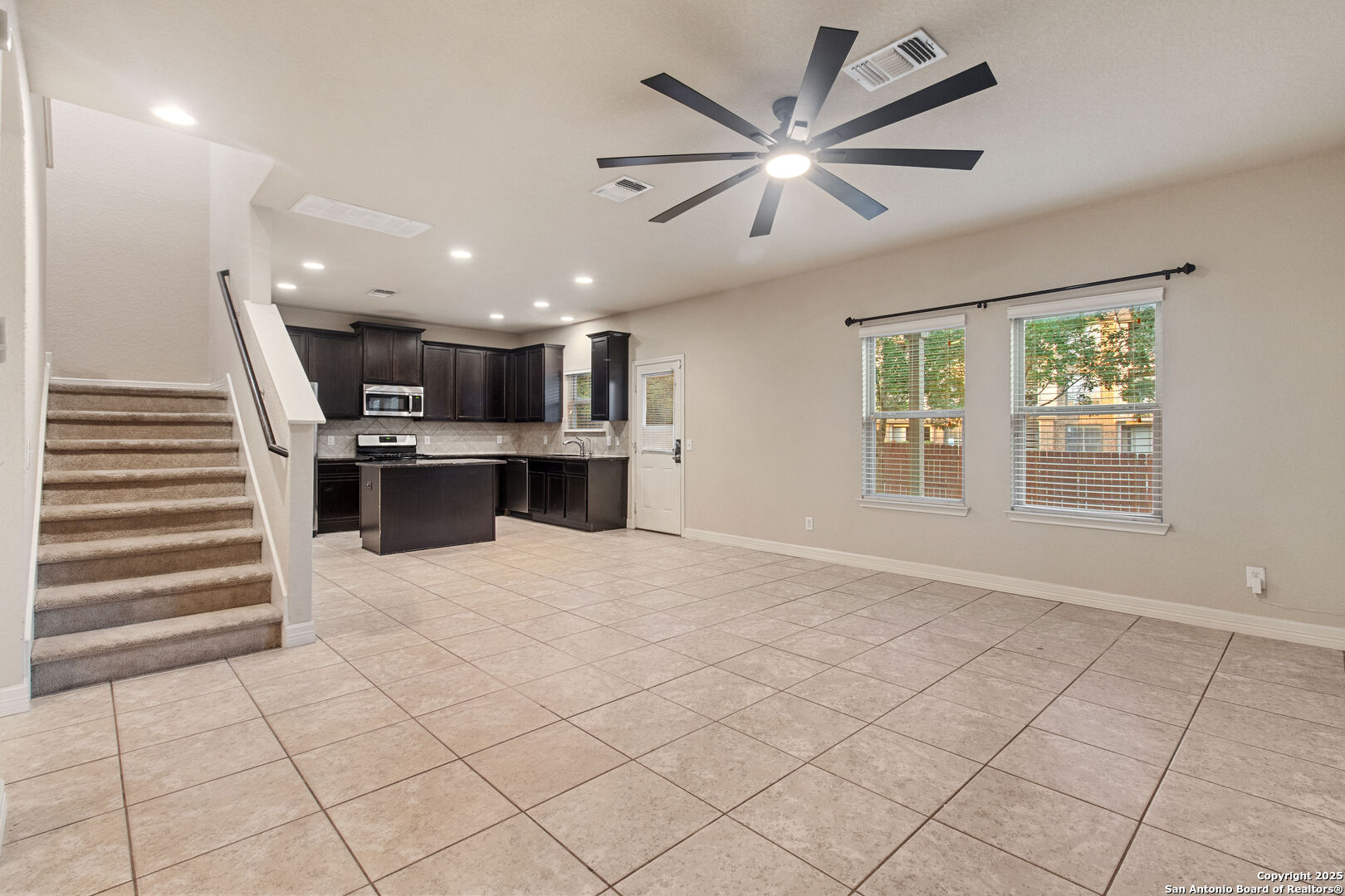8806 Atwater Creek San Antonio, TX 78245 - Photo 5 of 16 a view of kitchen and windows
