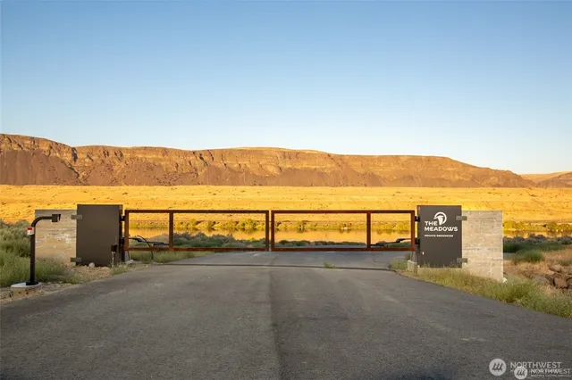 a view of an ocean and a mountain