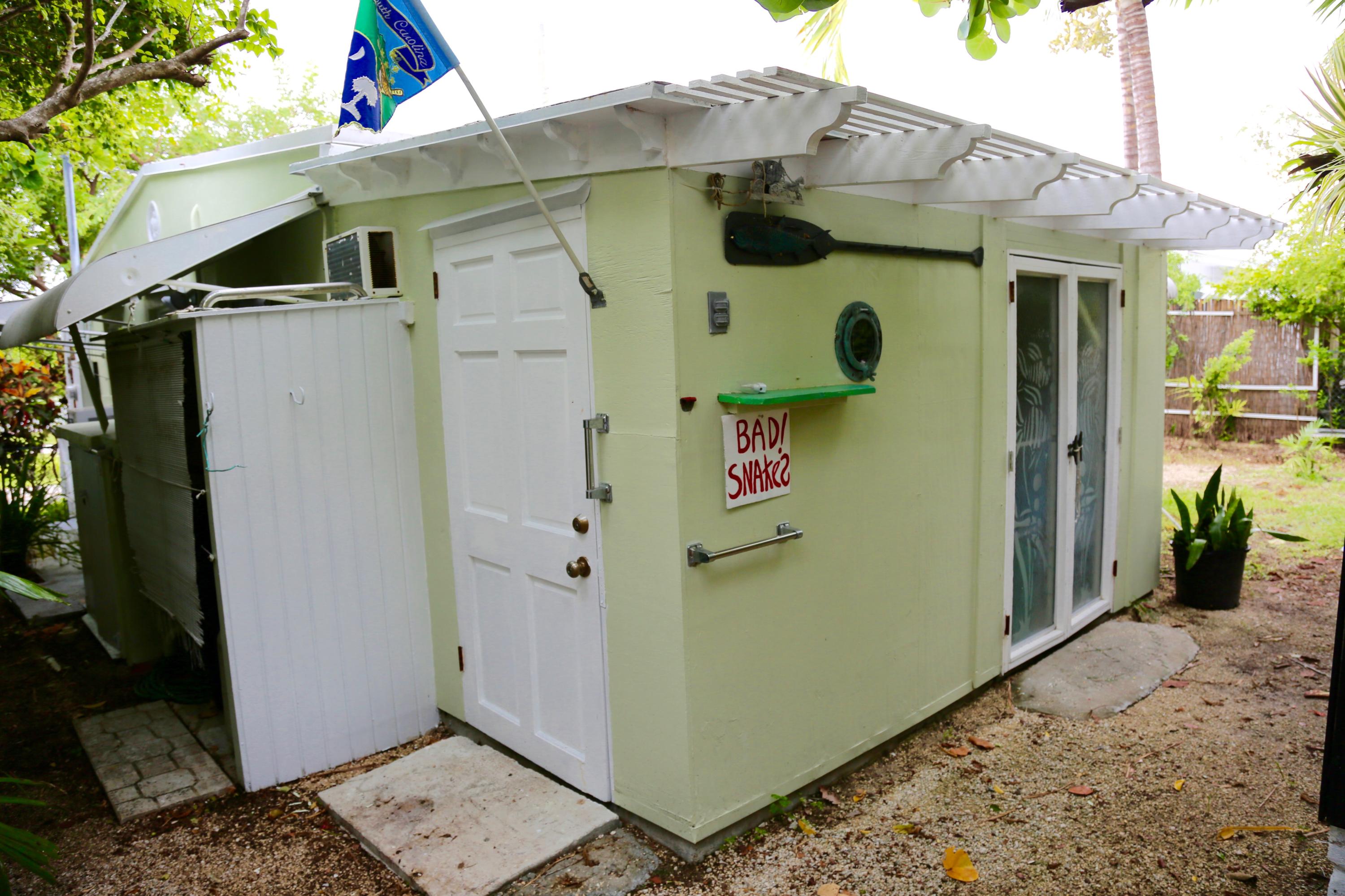 56 Buttonwood Drive Key Largo, FL 33037 - Photo 13 of 21 Storage shed / back of house