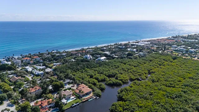 an aerial view of beach and ocean