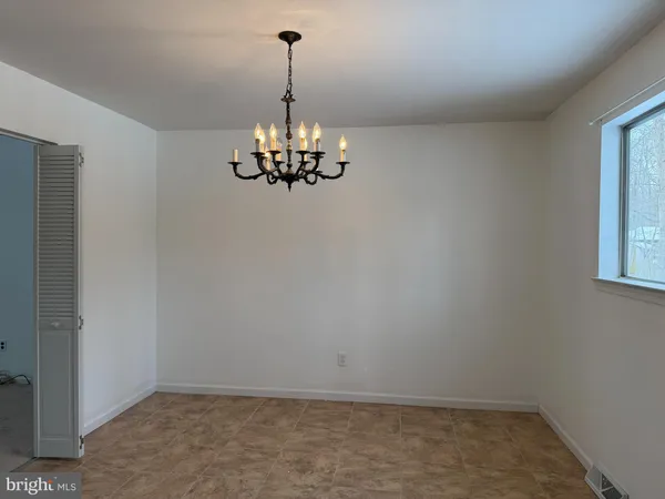 a view of a chandelier in a room