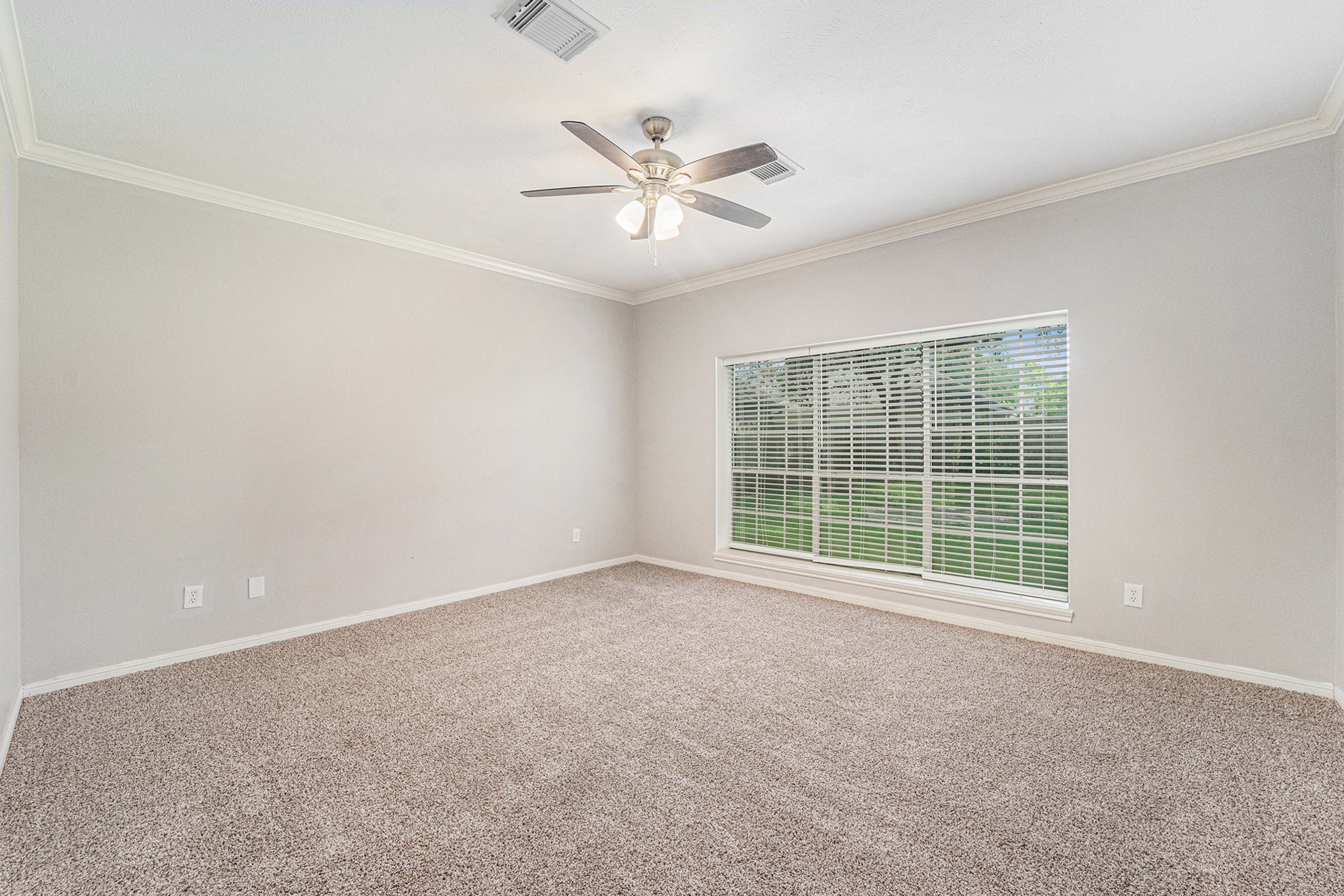15906 Marwick Court Houston, TX 77095 - Photo 12 of 23 a view of an empty room with a window