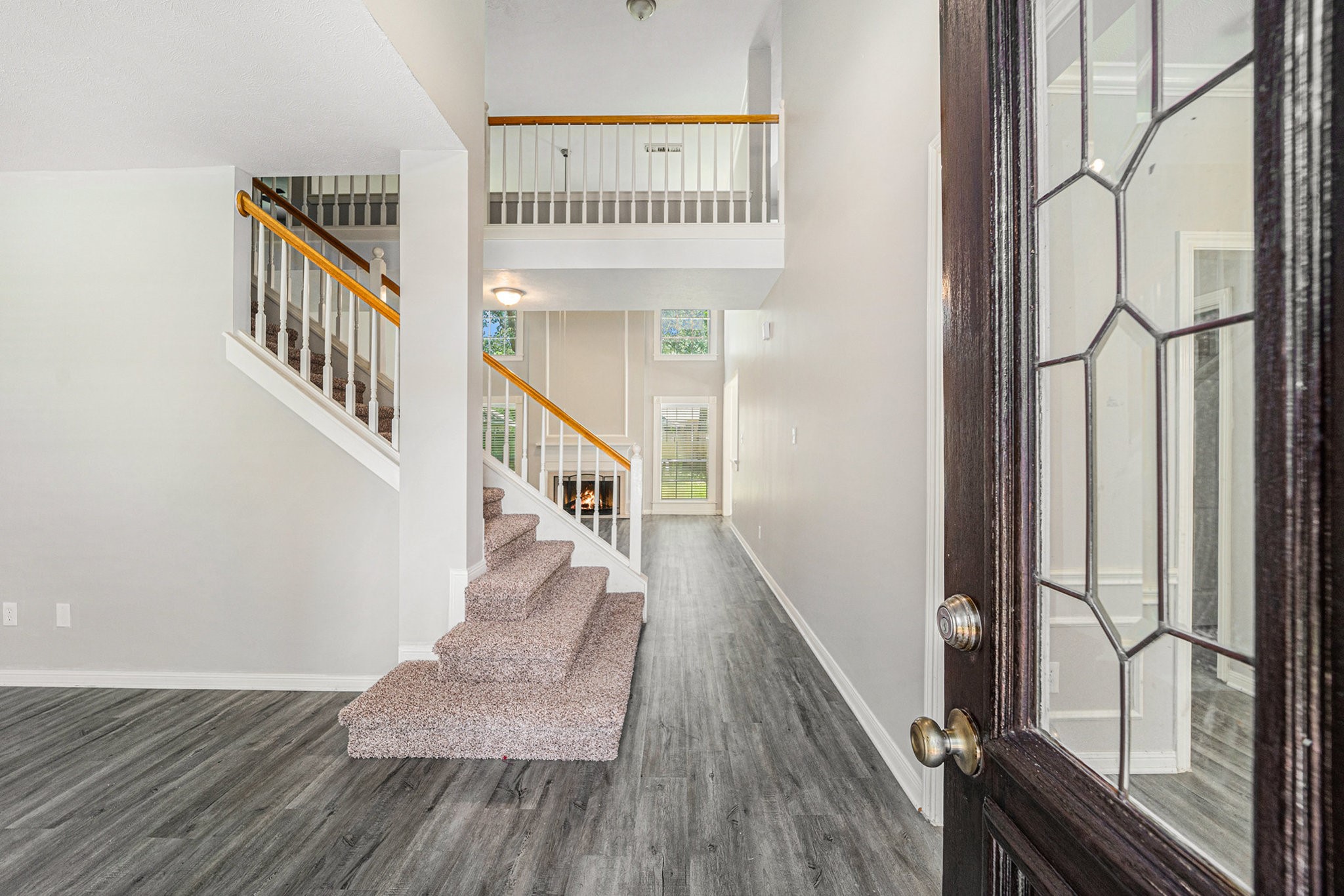 15906 Marwick Court Houston, TX 77095 - Photo 3 of 23 a view of an entryway with wooden floor