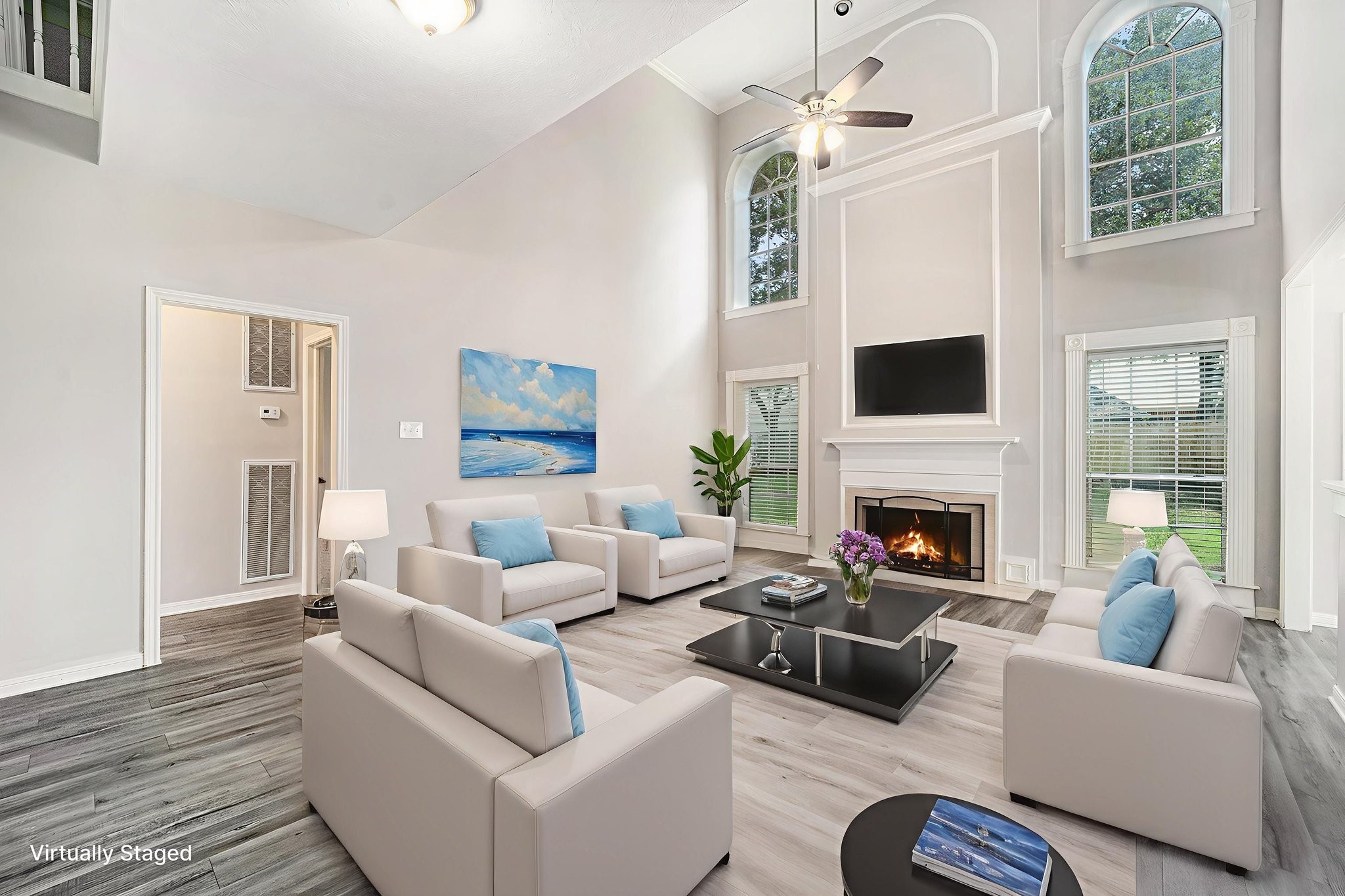 15906 Marwick Court Houston, TX 77095 - Photo 9 of 23 a living room with furniture a fireplace and a flat screen tv
