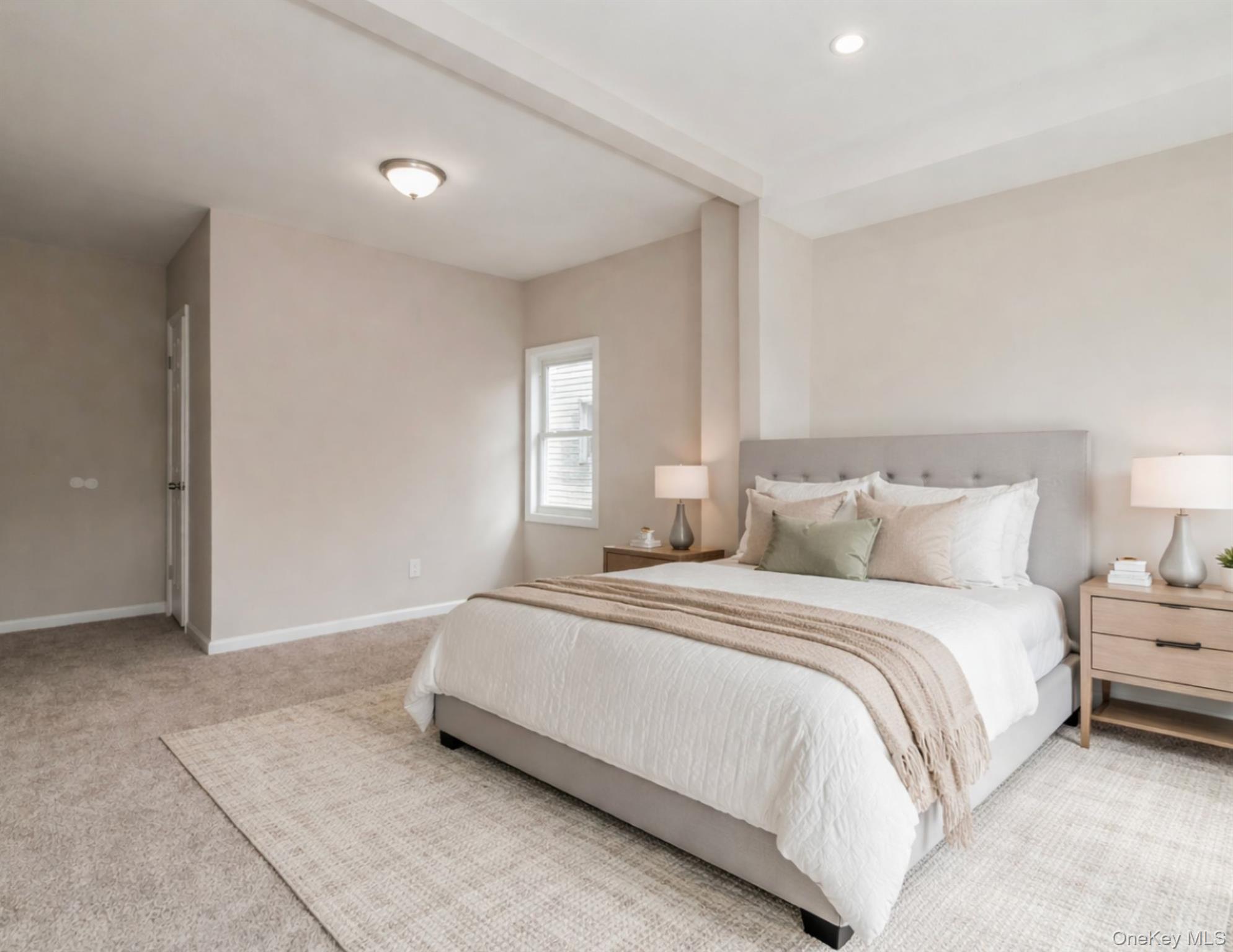 216-23 136th Road Queens, NY 11413 - Photo 3 of 28 Virtually Staged Carpeted bedroom featuring baseboards