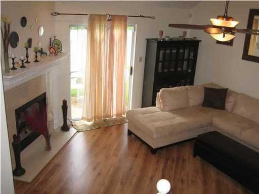 427 Bristol Cove Road Mary Esther, FL 32569 - Photo 2 of 3 a bedroom with a bed and a chandelier