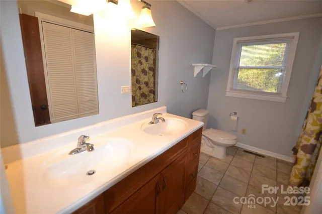 a bathroom with a sink and a toilet