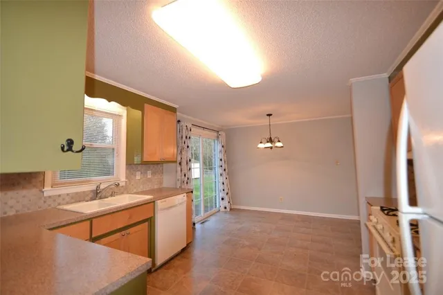a bathroom with a sink a tub and a mirror