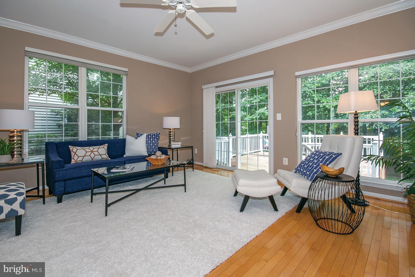 1301 Vintage Place Reston, VA 20194 - Photo 11 of 40 Living room opens to expansive deck