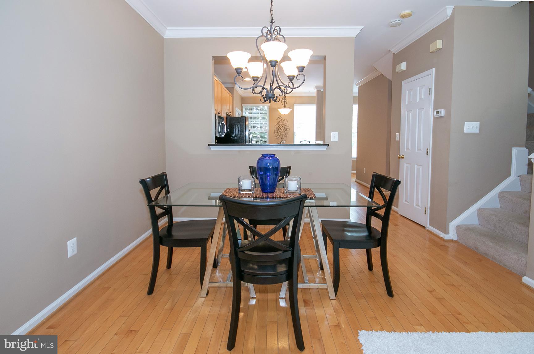 1301 Vintage Place Reston, VA 20194 - Photo 15 of 40 Dining area with pass-through to kitchen