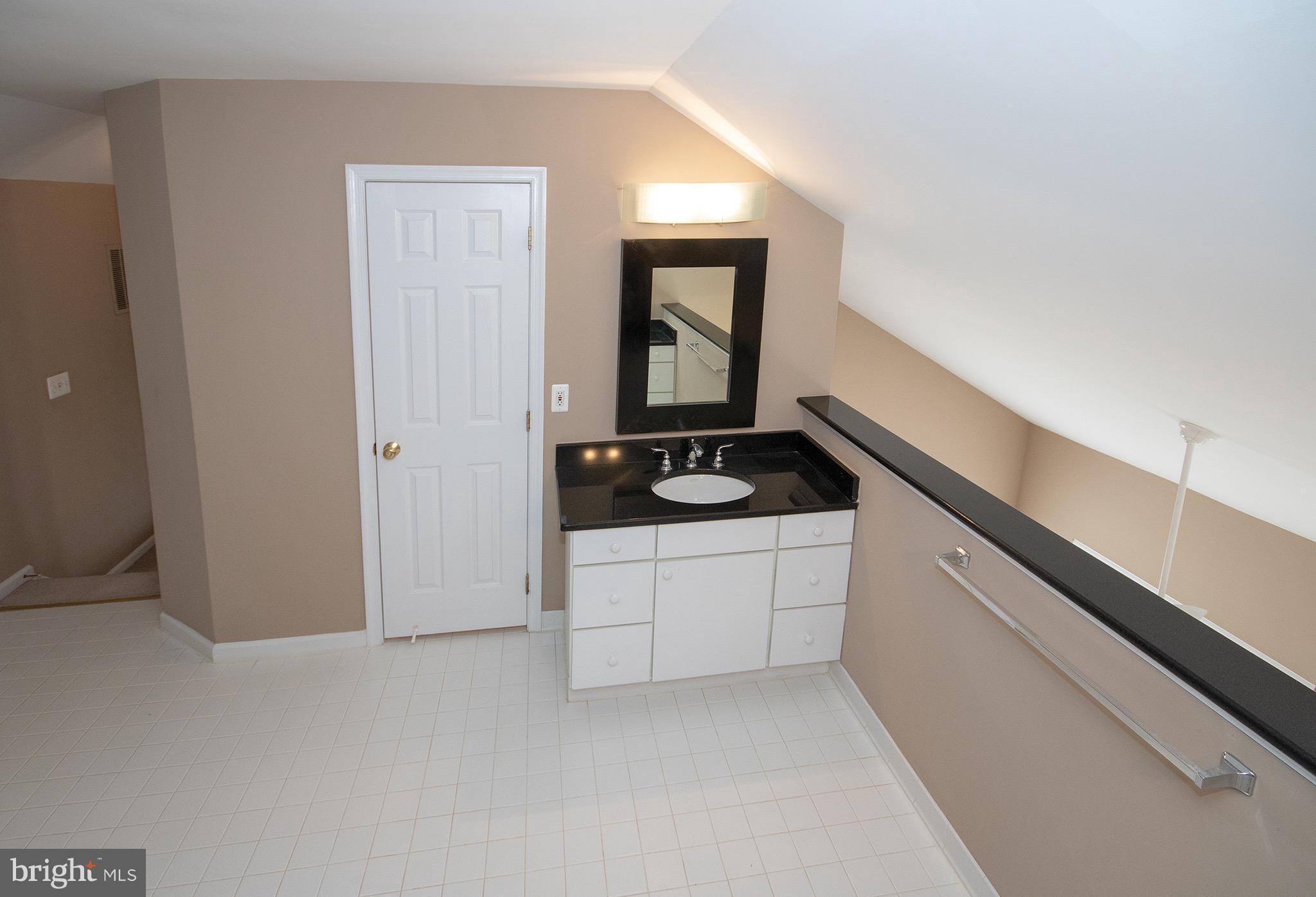 1301 Vintage Place Reston, VA 20194 - Photo 20 of 40 Second granite vanity and water closet with shower