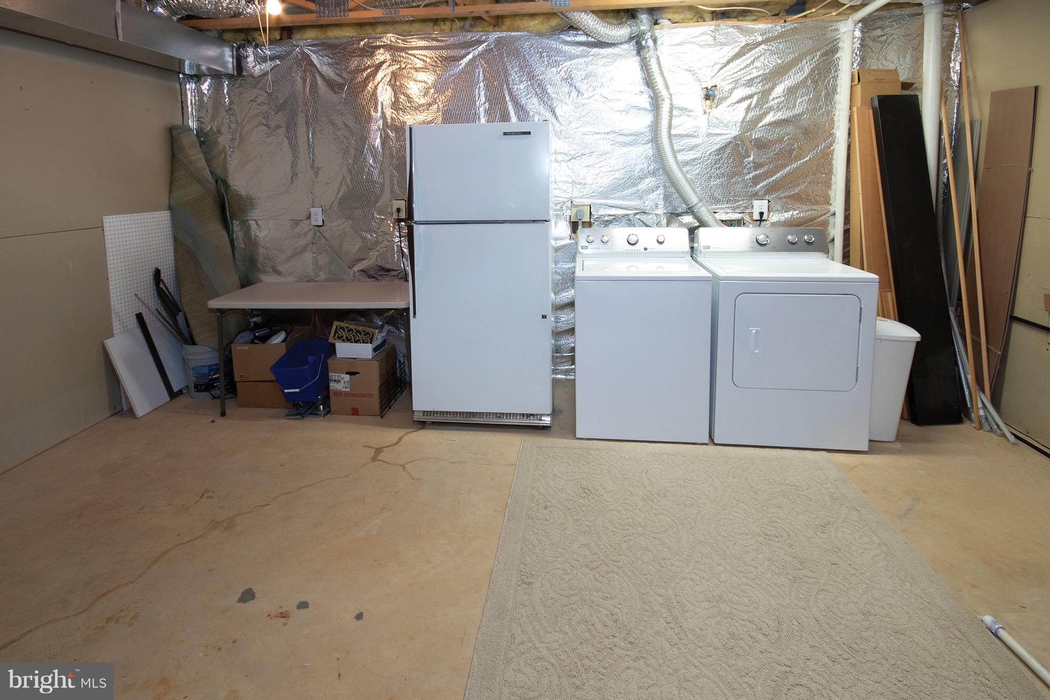 1301 Vintage Place Reston, VA 20194 - Photo 29 of 40 Laundry and Storage Area