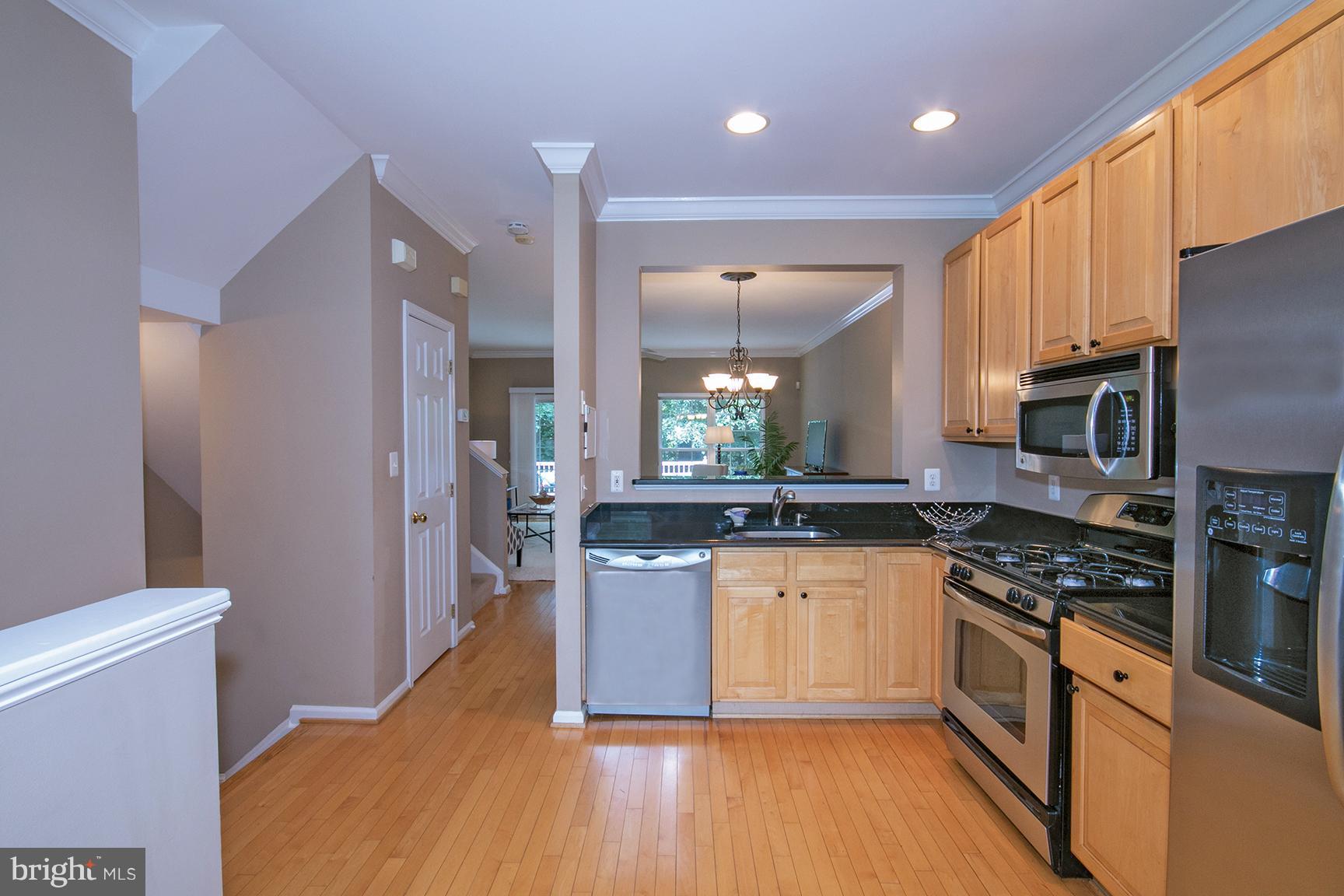 1301 Vintage Place Reston, VA 20194 - Photo 10 of 40 View of dining room through pass through