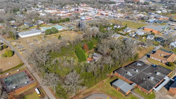 an aerial view of residential house with outdoor space