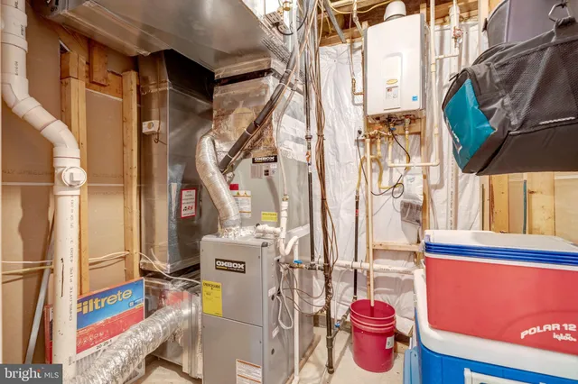 a bathroom with a sink a mirror and shower