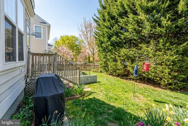 a view of balcony with wooden floor