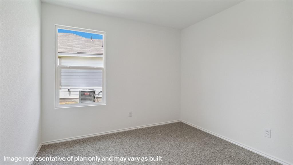 1805 Teton River Drive Blue Ridge, TX 75424 - Photo 17 of 22 a view of an empty room with a window