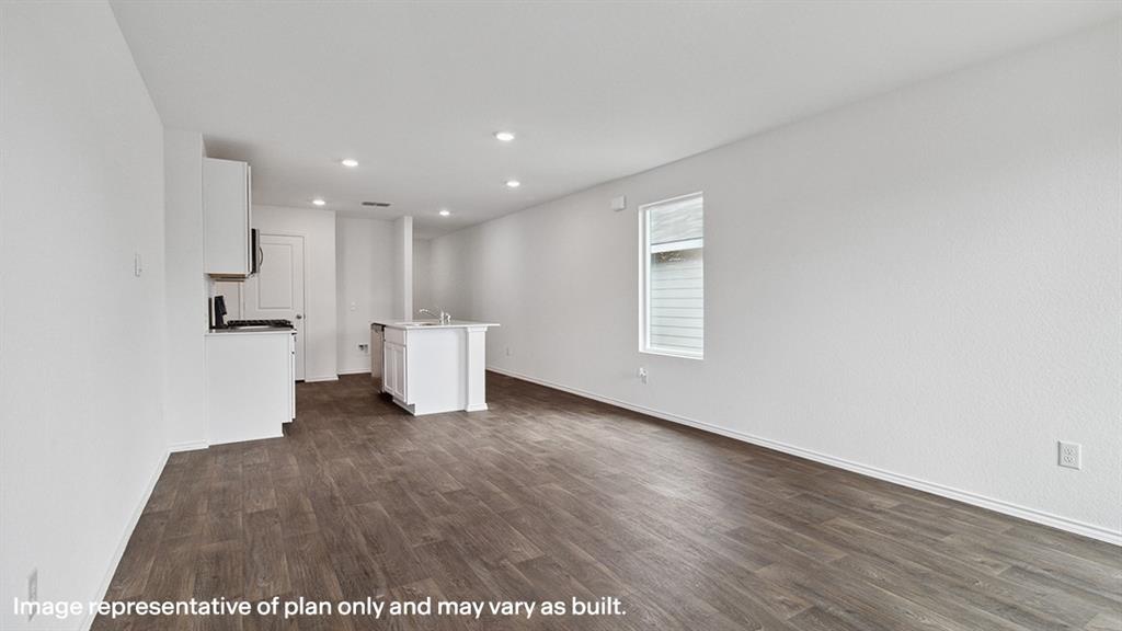 1805 Teton River Drive Blue Ridge, TX 75424 - Photo 10 of 22 a view of an empty room with wooden floor and a window