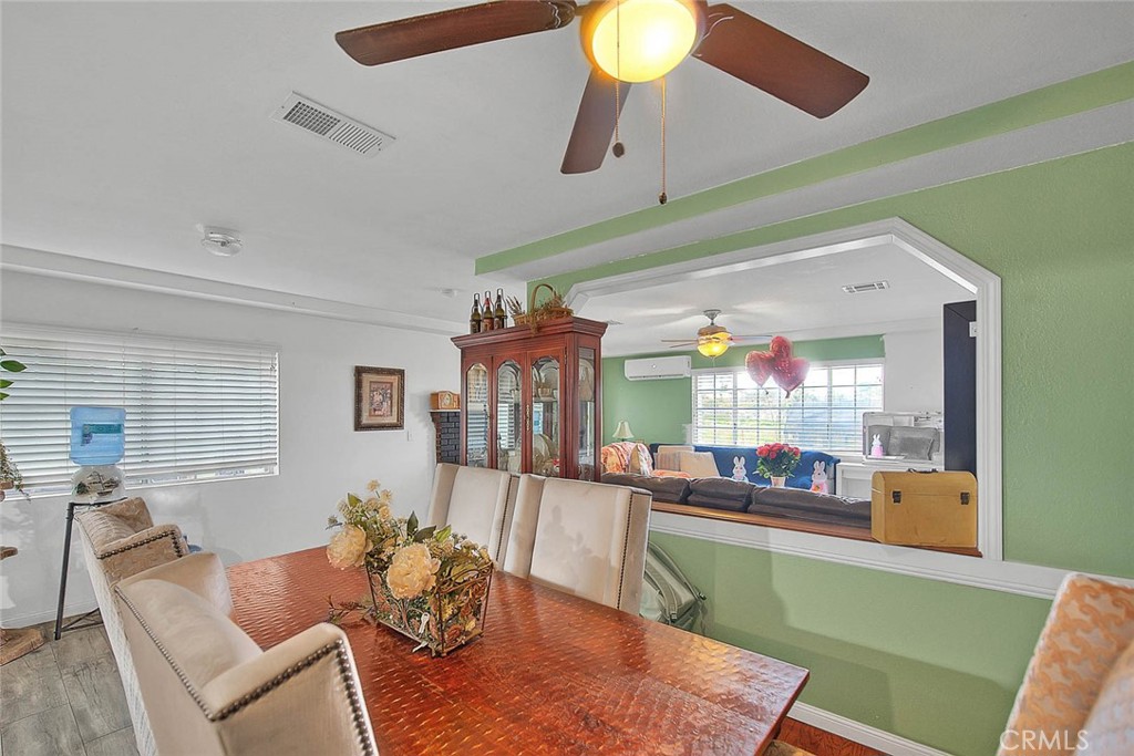 8529 Nielson Road Phelan, CA 92371 - Photo 13 of 44 a living room with furniture and wooden floor