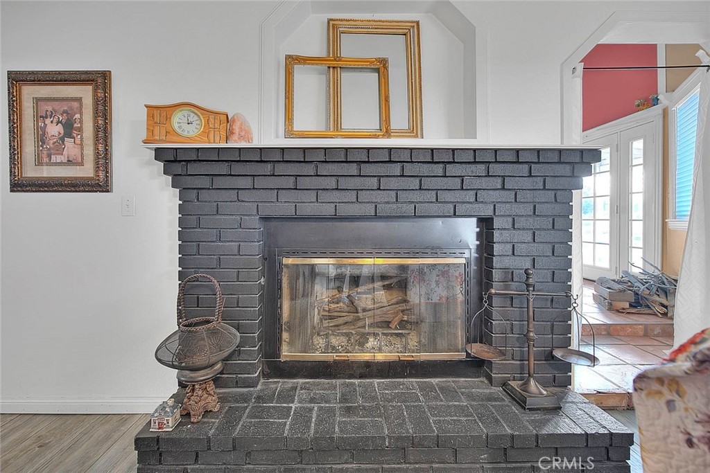 8529 Nielson Road Phelan, CA 92371 - Photo 18 of 44 a living room with fireplace