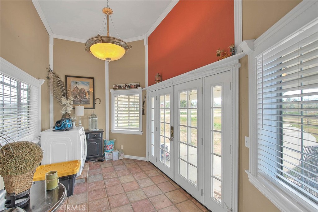 8529 Nielson Road Phelan, CA 92371 - Photo 19 of 44 a view of a dining room with furniture wooden floor and chandelier