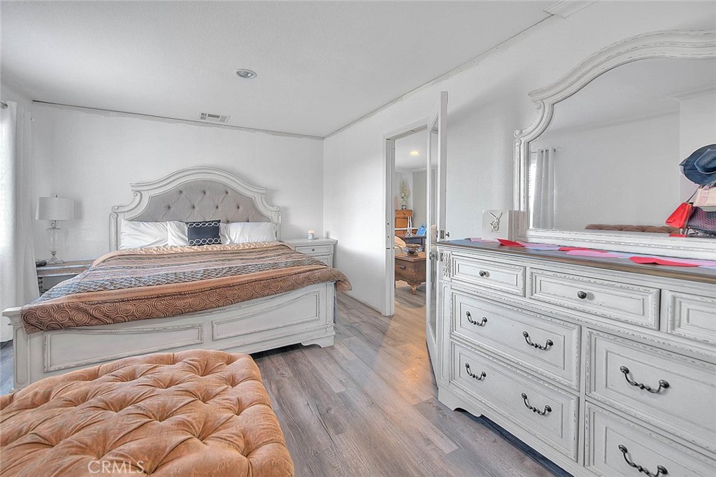 8529 Nielson Road Phelan, CA 92371 - Photo 20 of 44 a bedroom with a bed and a dresser