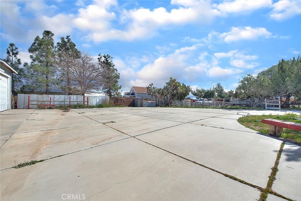 8529 Nielson Road Phelan, CA 92371 - Photo 26 of 44 a view of swimming pool with a yard