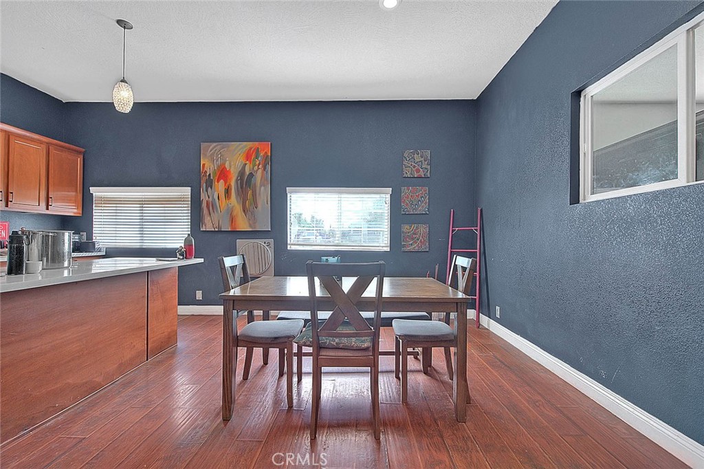 8529 Nielson Road Phelan, CA 92371 - Photo 31 of 44 a view of a dining room with furniture and wooden floor