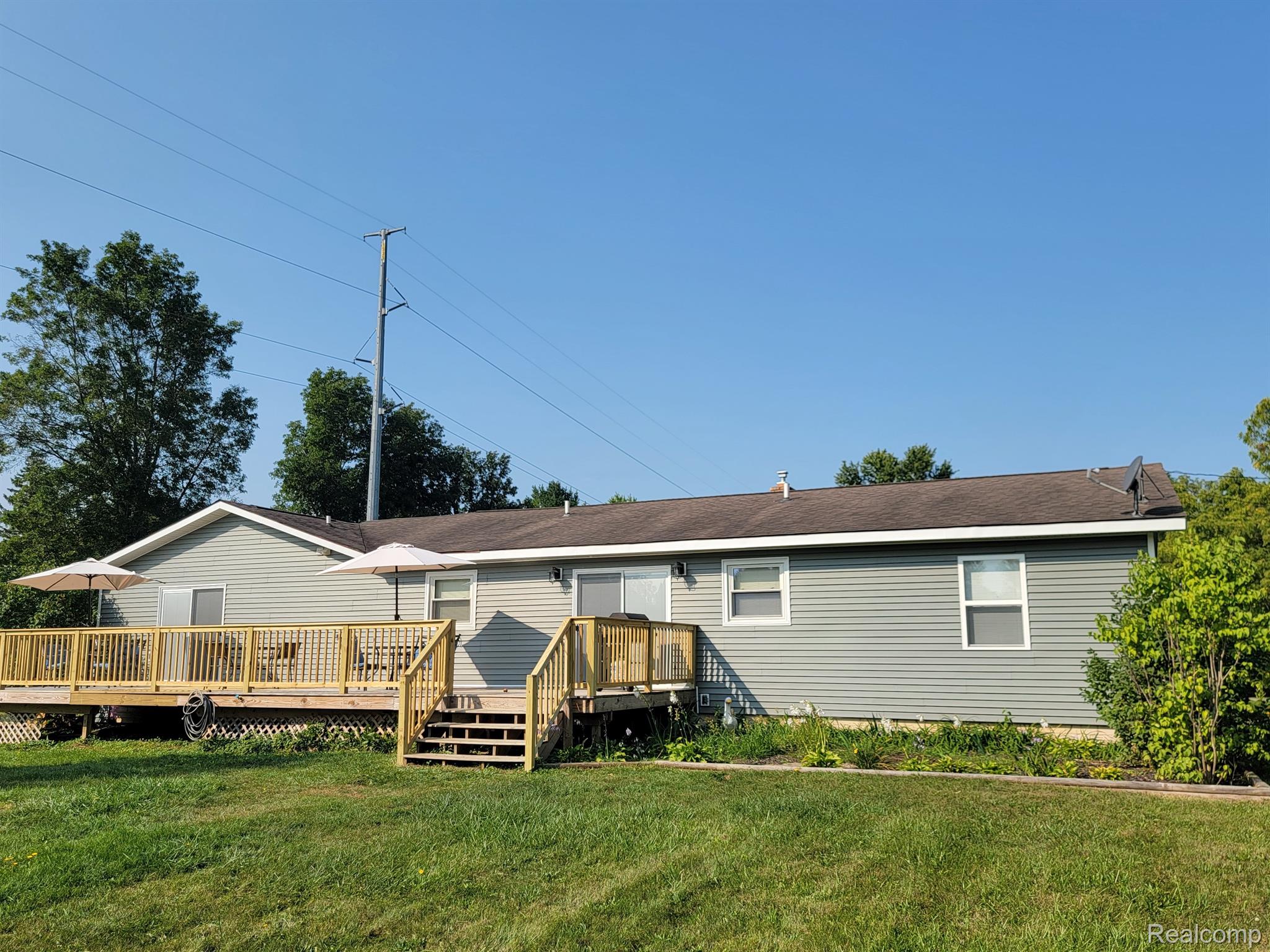 4265 Howe Road Grand Blanc, MI 48439 - Photo 20 of 23 Rear of house