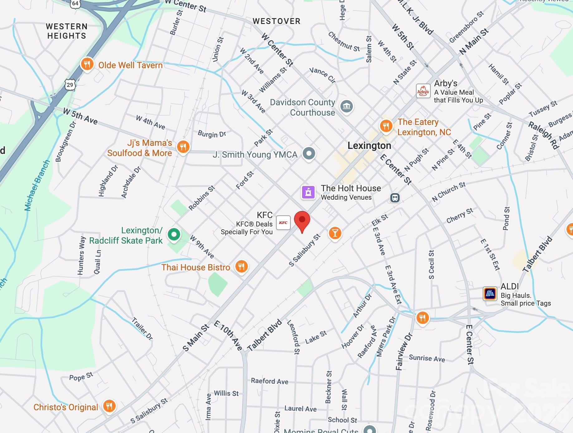 511 South Main Street Lexington, NC 27292 - Photo 4 of 5 a white and white shower with a white umbrella