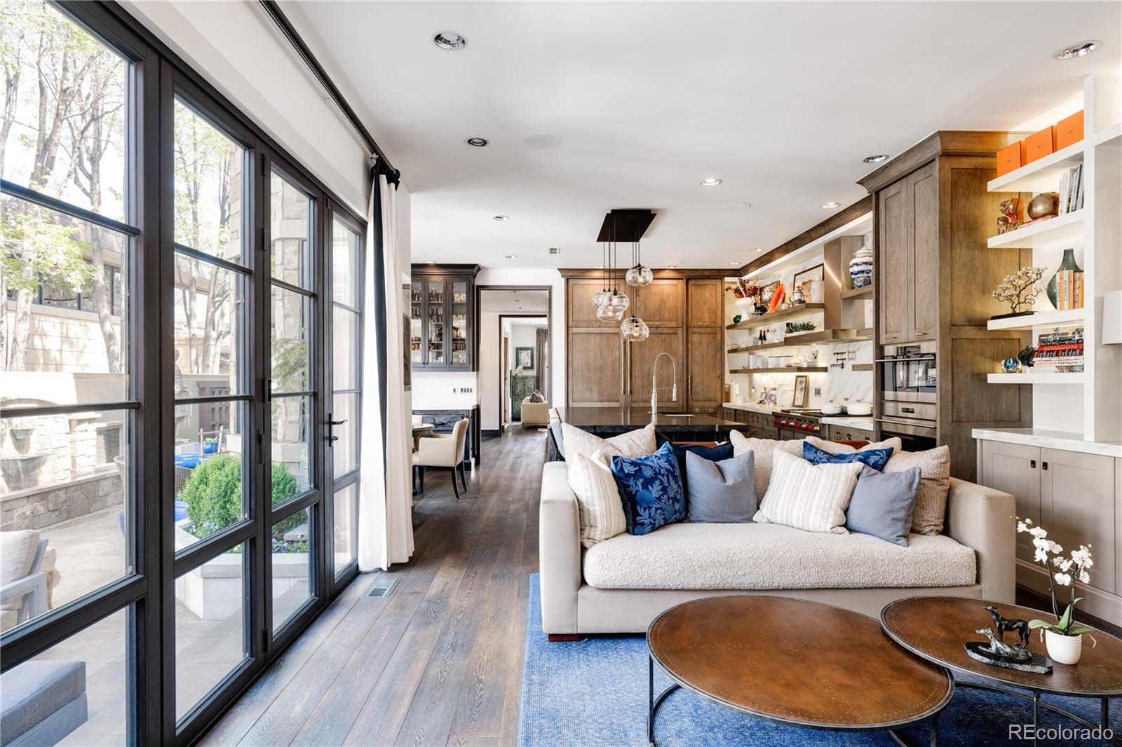 469 Cook Street Denver, CO 80206 - Photo 21 of 50 a living room with furniture and a large window