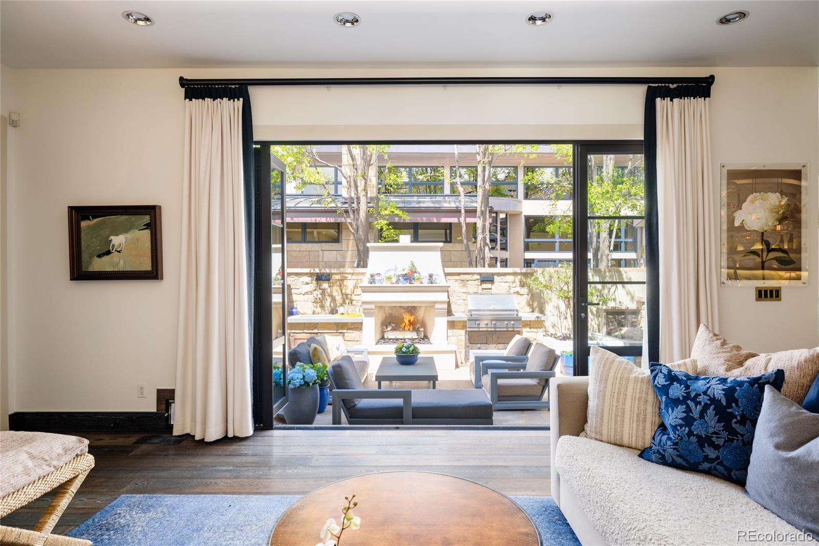 469 Cook Street Denver, CO 80206 - Photo 22 of 50 a living room with furniture and a large window