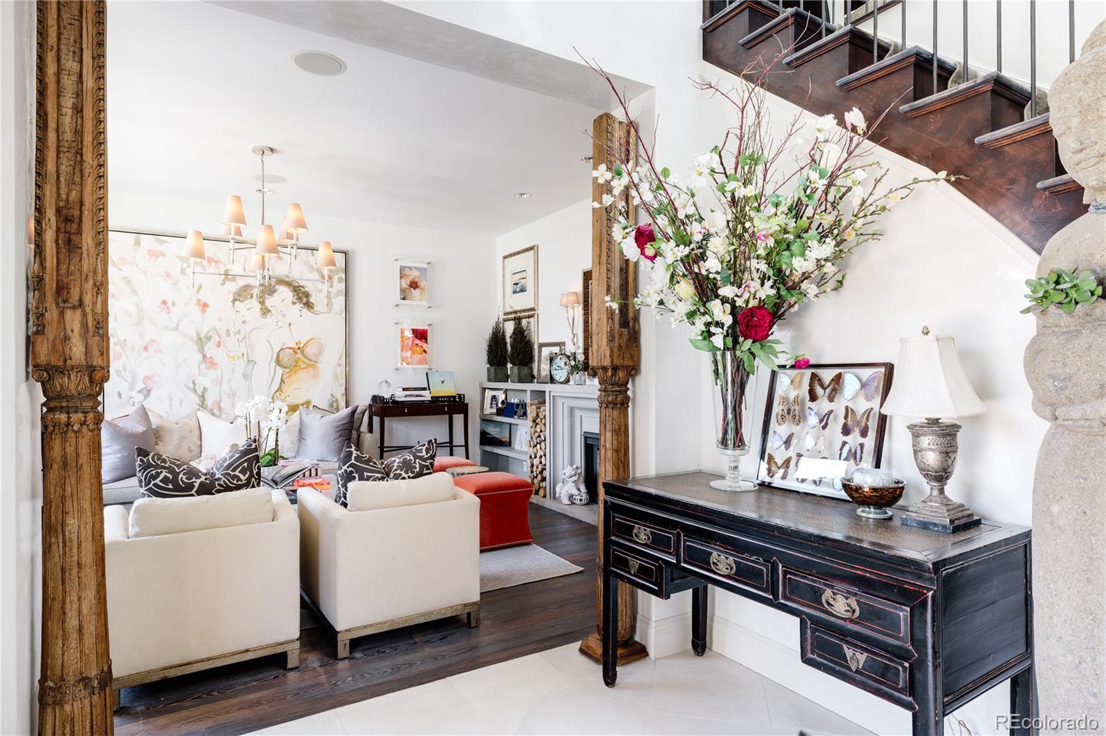 469 Cook Street Denver, CO 80206 - Photo 4 of 50 a living room with furniture and flowers