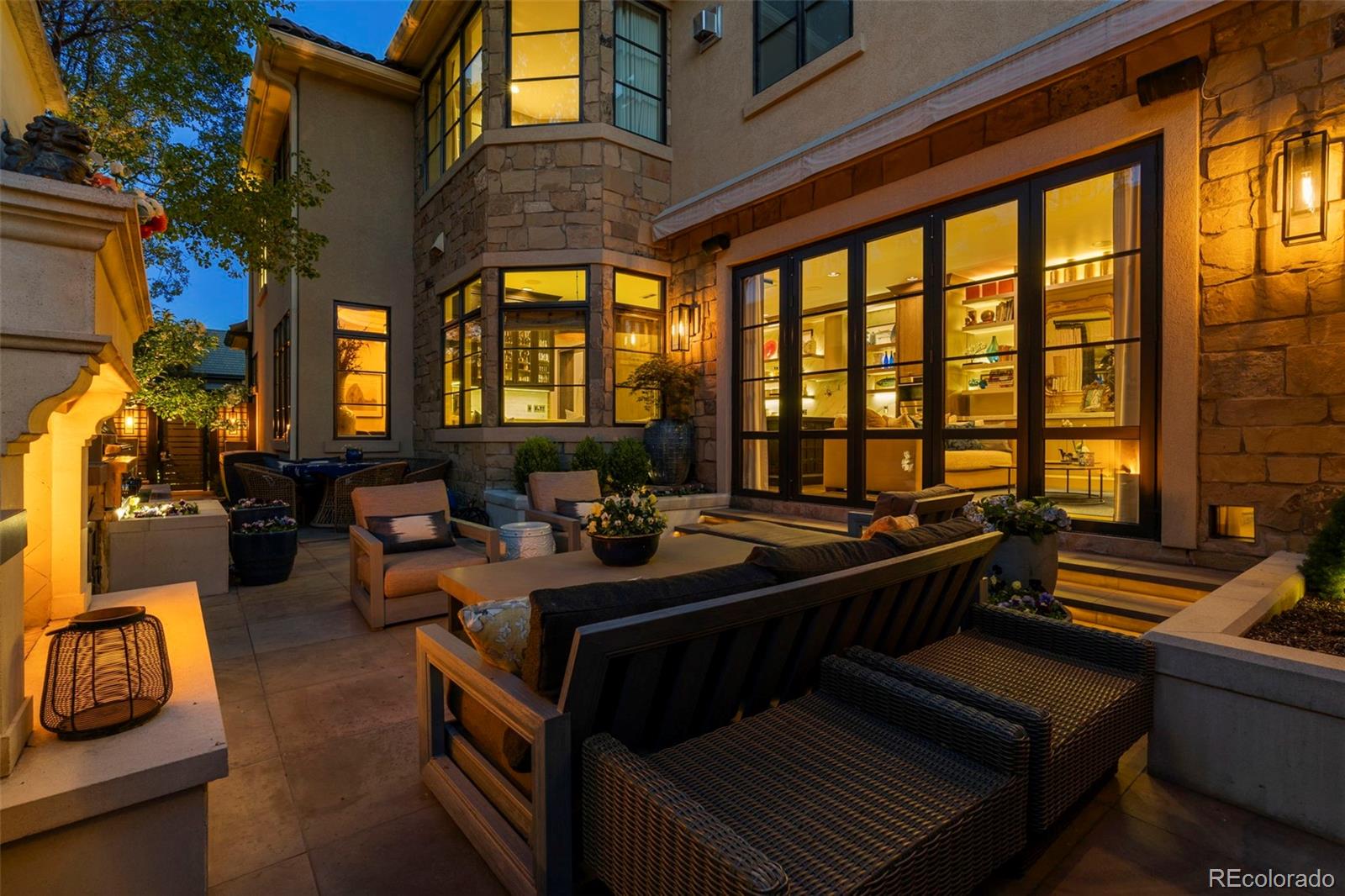 469 Cook Street Denver, CO 80206 - Photo 49 of 50 a living room with furniture and a floor to ceiling window