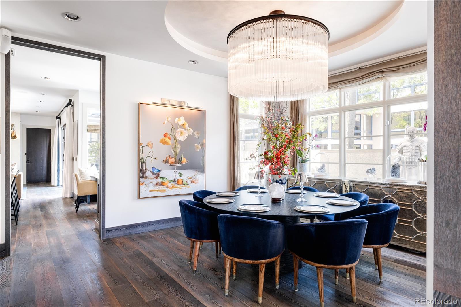 469 Cook Street Denver, CO 80206 - Photo 8 of 50 a view of a dining room with furniture window and wooden floor
