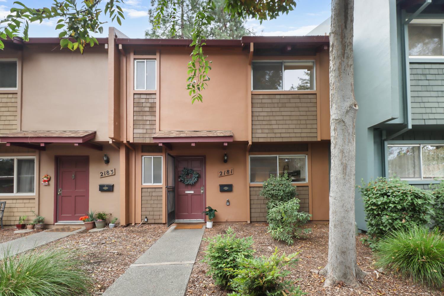 2181 Bella Casa Street Davis, CA 95616 - Photo 1 of 1 a front view of a house with a garden