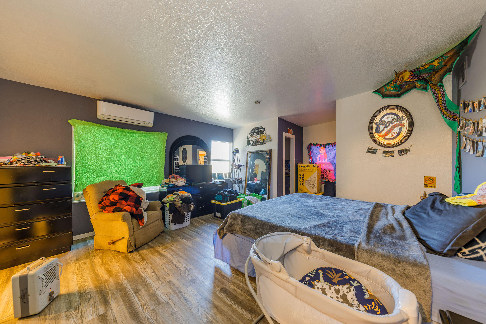 6790 Holland Loop Road Cave Junction, OR 97523 - Photo 110 of 151 a living room with furniture and a flat screen tv