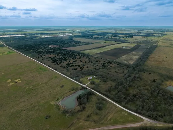 a view of a back yard of a house