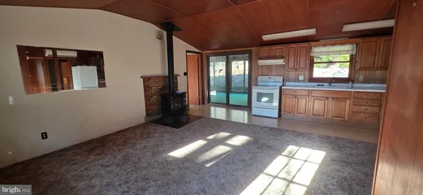 a view of livingroom with furniture and windows
