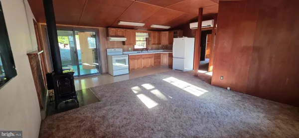 a view of a hallway with windows