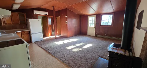 a view of a kitchen with a sink