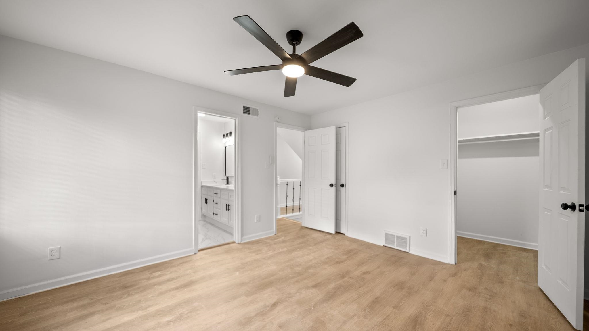 4351 Spring Oak Cove Memphis, TN 38125 - Photo 29 of 40 an empty room with closet and windows