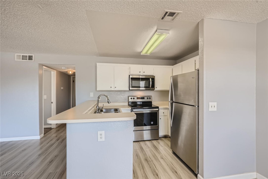 2977 Juniper Hills Boulevard, Unit 202 Las Vegas, NV 89142 - Photo 13 of 28