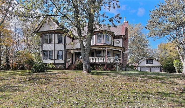 11906 Burr Street Crown Point, IN 46307 - Photo 2 of 10 a front view of a house with a yard