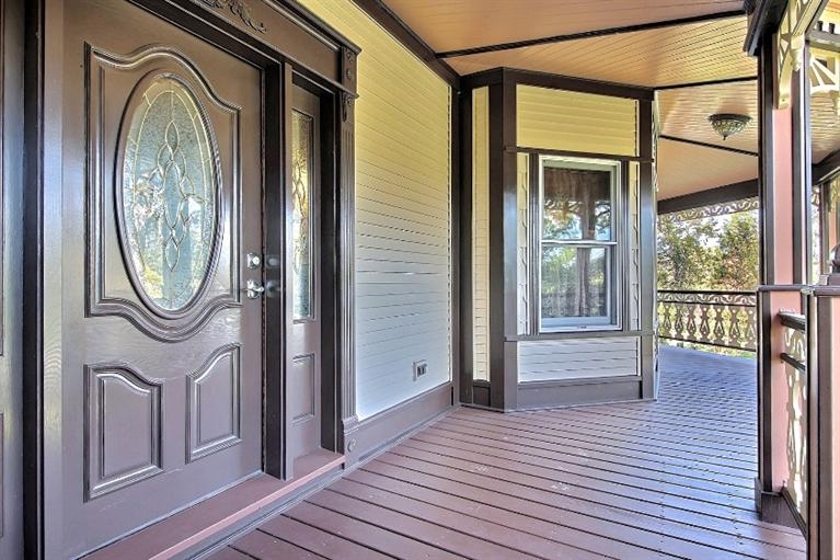 11906 Burr Street Crown Point, IN 46307 - Photo 4 of 10 a view of a hallway with wooden floor and a window