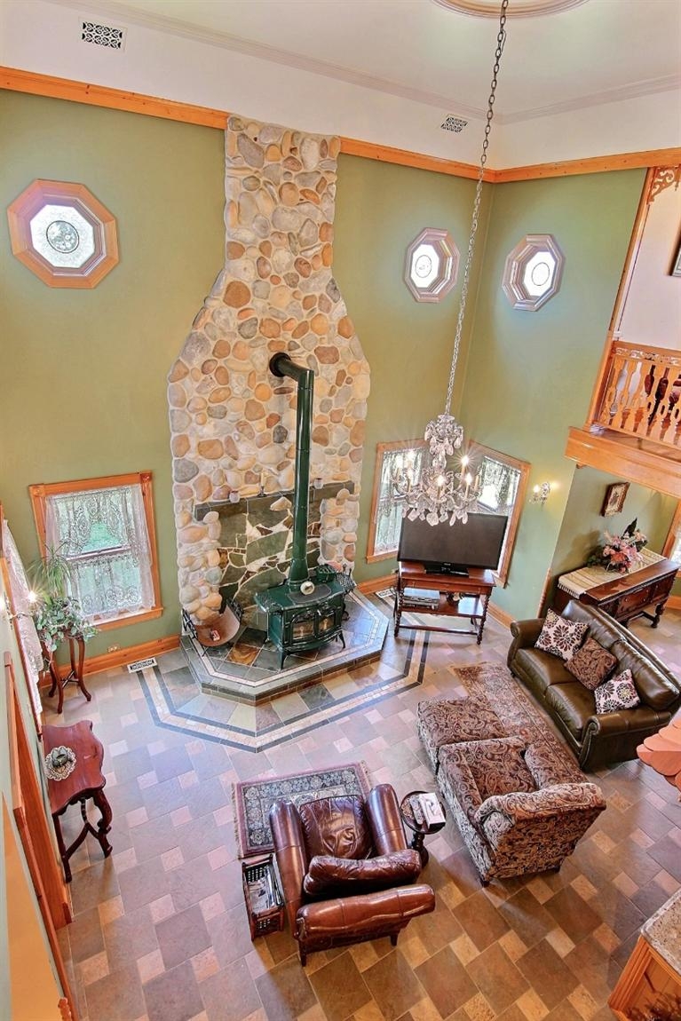 11906 Burr Street Crown Point, IN 46307 - Photo 10 of 10 a room with furniture and a flat screen tv