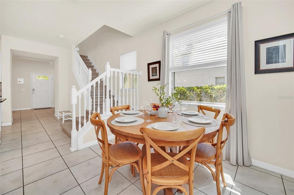 2070 Rome Drive Kissimmee, FL 34747 - Photo 19 of 57 a dining room with furniture and window