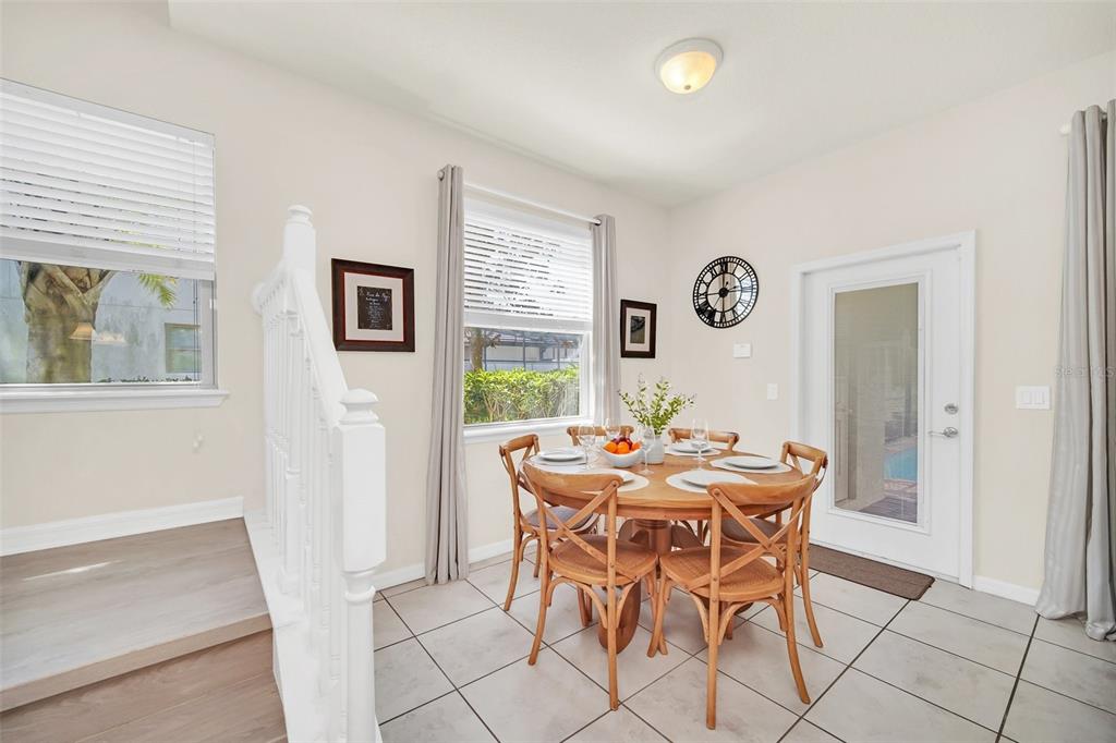 2070 Rome Drive Kissimmee, FL 34747 - Photo 23 of 57 a view of a dining room with furniture and a window
